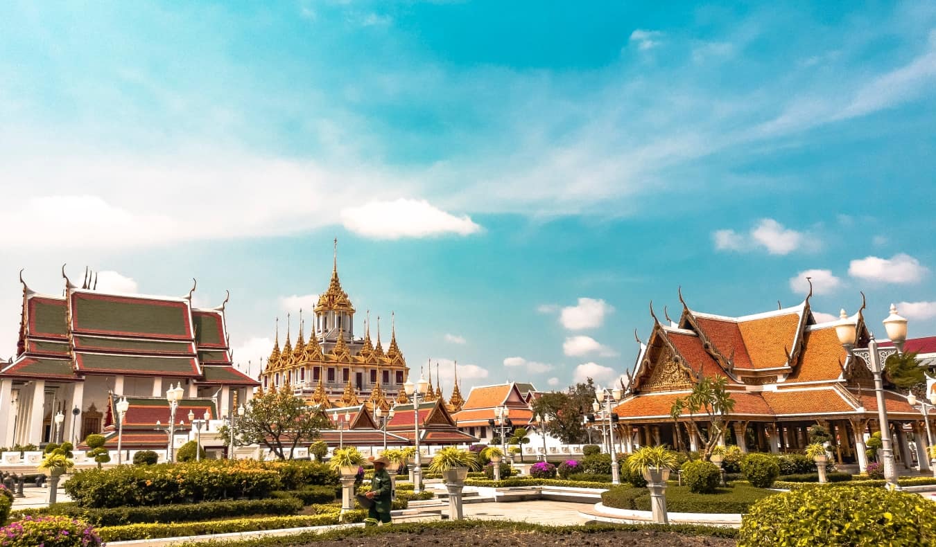 Buddhist temples against a sunny sky in Bangkok, Thailand