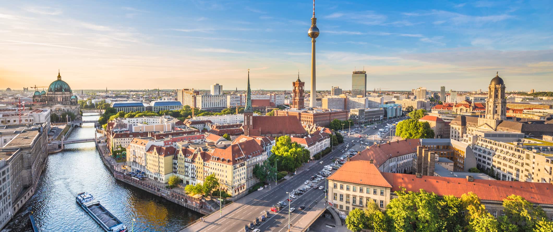 A sweeping view over Berlin, Germany at sunset with the iconic TV tower in the distance