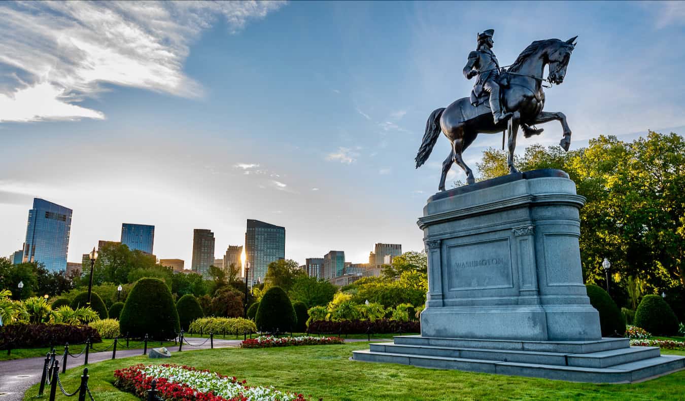 A towering statue in a relaxing park in Boston, USA