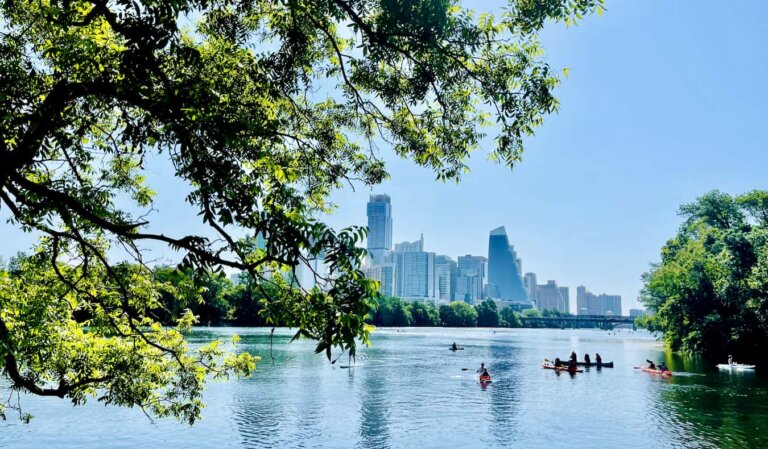 People out enjoying the water on a sunny day in Austin, Texas