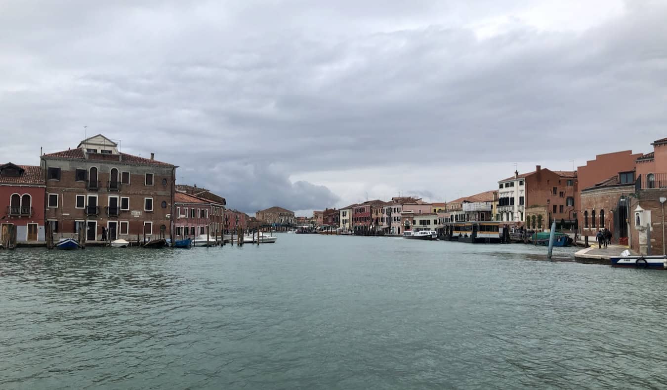 Gorgeous view of the famous wide canals of Venice, Italy with historic buildings in the distance