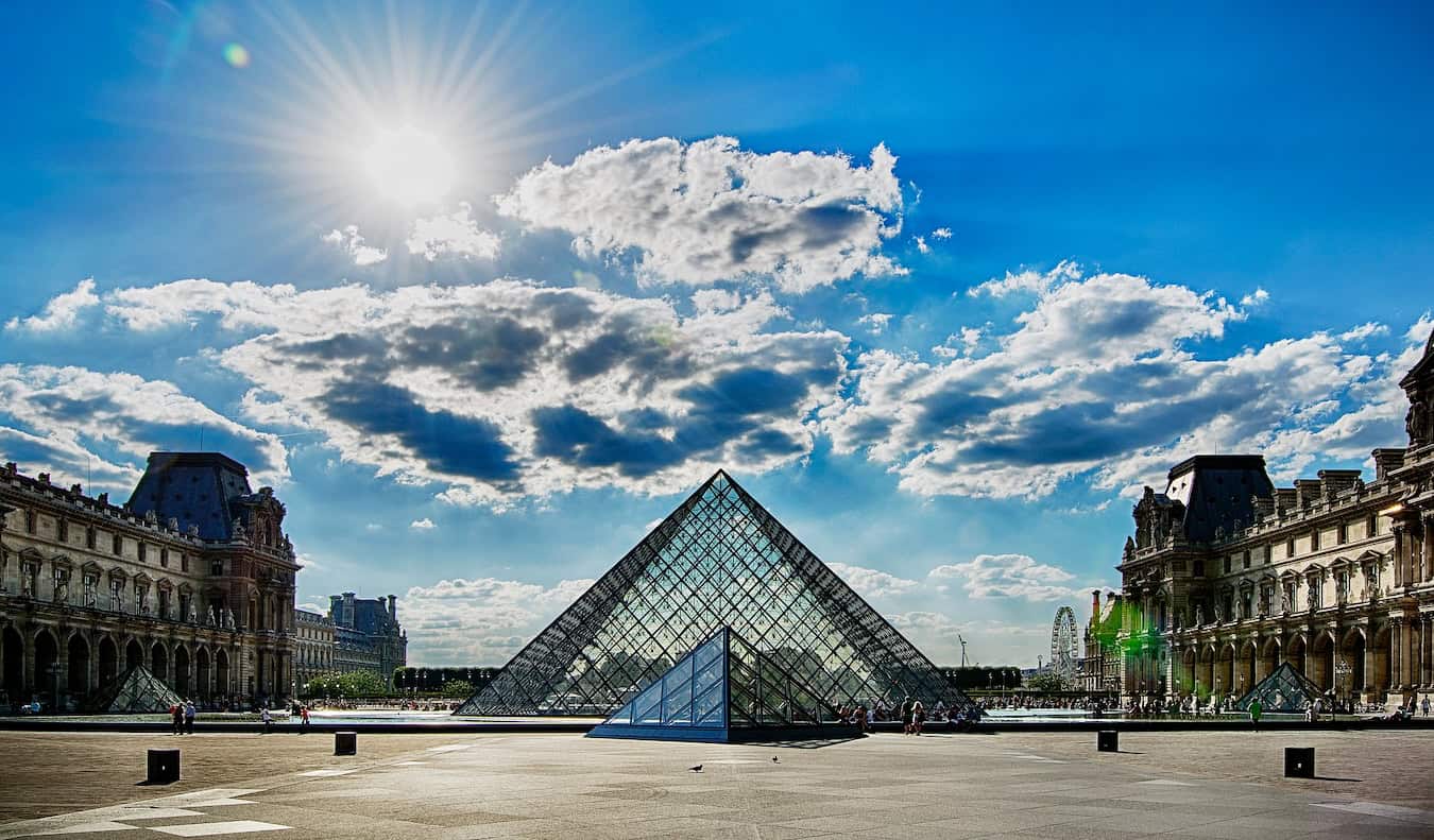 The famous and iconic Louvre on a sunny day in Paris, France