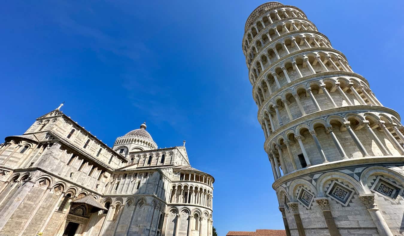 Thw towering and crooked Leaning Tower of Pisa in Pisa, Italy on a sunny summer day