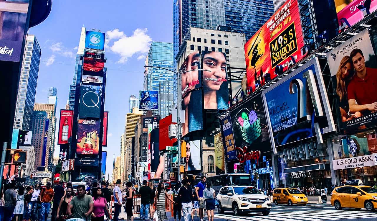 The crowds of tourists packing into cheesy Times Square in New York City