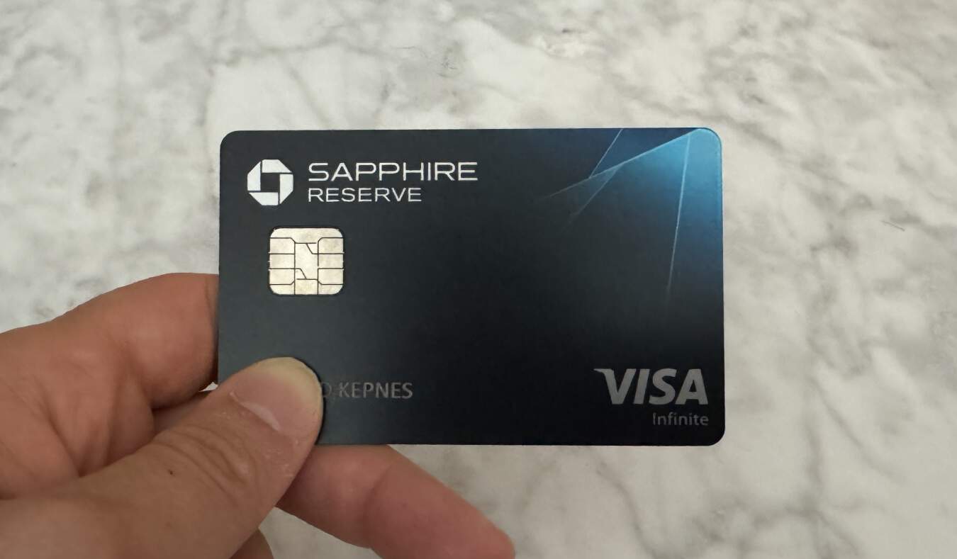 Nomadic Matt holding the Chase Sapphire Reserve Card