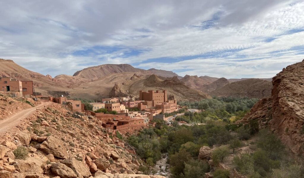 ust red villages along a dusty road in Dades Valley, Morocco