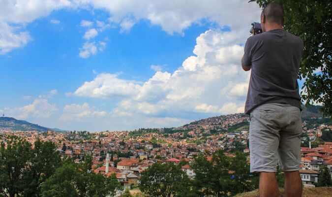 David Dean photographing a city in Europe