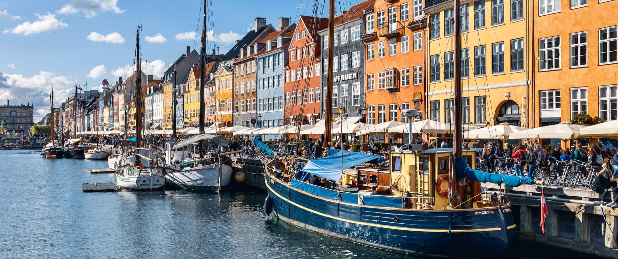 The famous colorful row houses along the canals of Copenhagen, Denmark in the summer