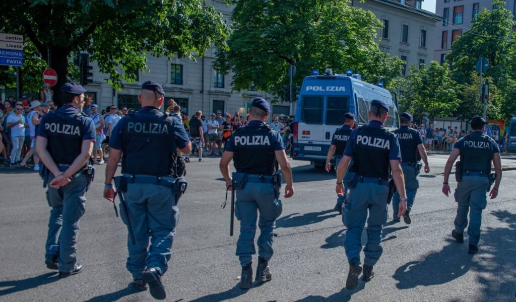 Police walking the streets of Milan, Italy