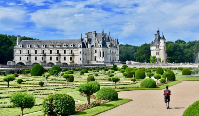 Nomadic Matt in France walking near a castle in the Loire Valley