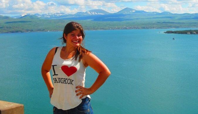 Lauren posing in front of a lake