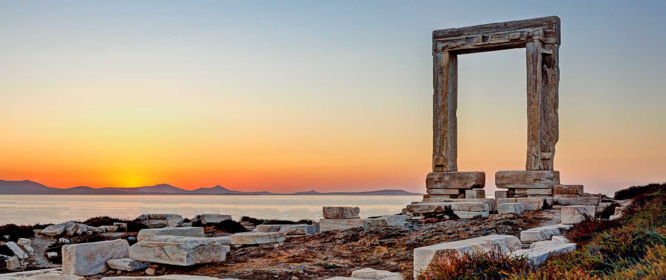 The marble Portara gate at sunset in Naxos, Greece.