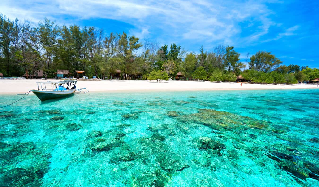 The gorgeous, sandy beaches of the Gili Islands in Indonesia, with crystal clear waters