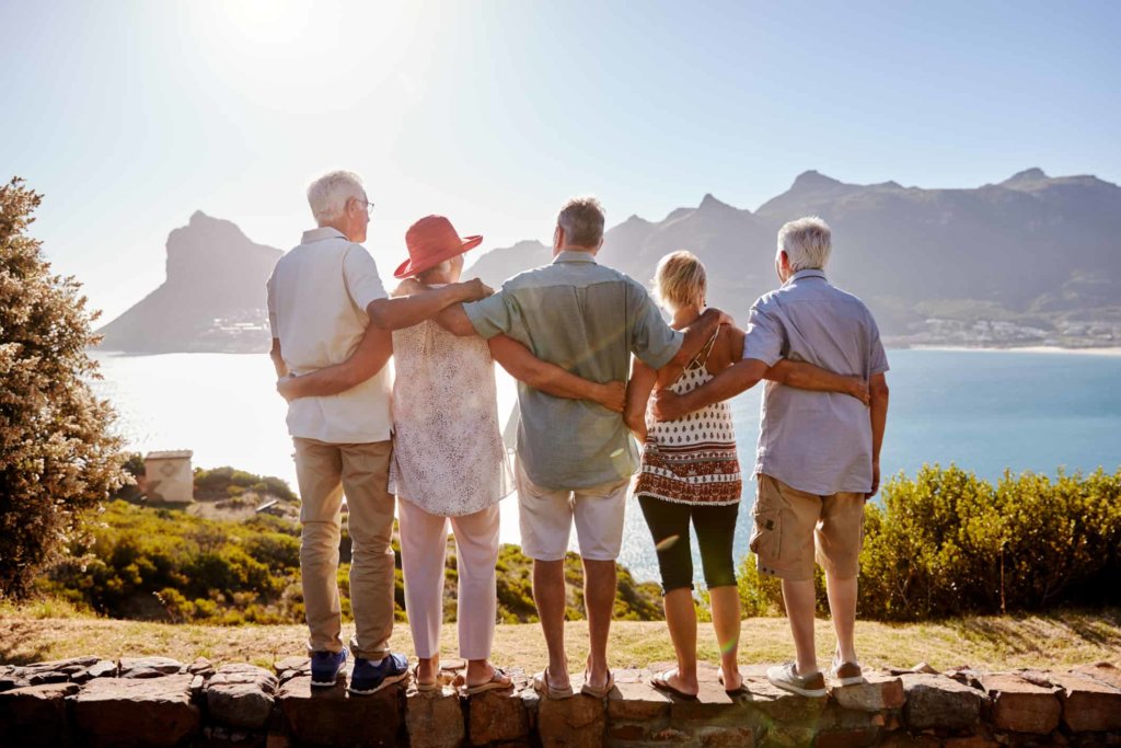 A group of senior travelers at the beach