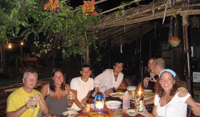 Nomadic Matt with backpackers on the island of Ko Lipe