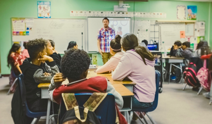 A ESL teacher giving a lesson in a classroom